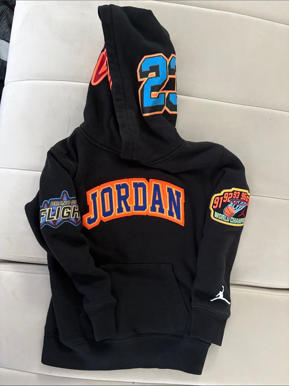 Jordan Black Pullover Hoodie with Orange & Blue Accents